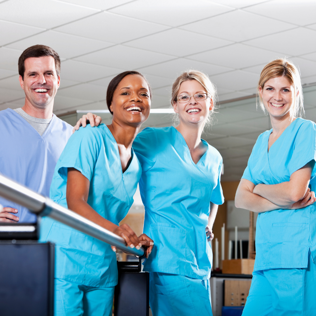 Physical therapists in rehabilitation room Physical therapists in rehabilitation room