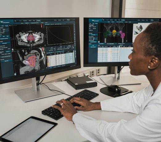 Radiology Tech examining screens